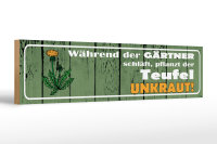 Holzschild Spruch 46x10cm während Gärtner schläft pflanzt Teufel Unkraut