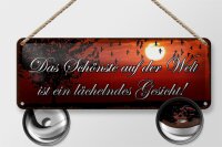 Blechschild Spruch 27x10cm das schönste lächelndes Gesicht Dekoration