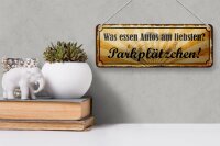 Blechschild Spruch 27x10cm was essen Autos Parkplätzchen Dekoration