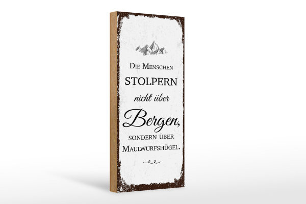 Holzschild Spruch Menschen stolpern nicht über Bergen 10x27cm