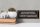 Holzschild Spruch 27x10cm De Belastingdienst gaat er mee stoppen