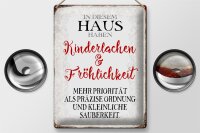 Blechschild Spruch 30x40cm in diesem Haus Kinderlachen