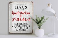 Blechschild Spruch 30x40cm in diesem Haus Kinderlachen