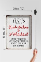 Blechschild Spruch 30x40cm in diesem Haus Kinderlachen
