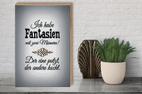 Holzschild Spruch 30x40cm Fantasien zwei Männer 1 putzt